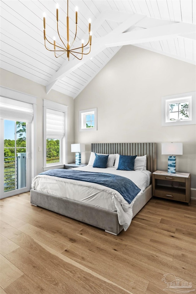 bedroom with wood-type flooring, vaulted ceiling with beams, access to outside, and wood ceiling