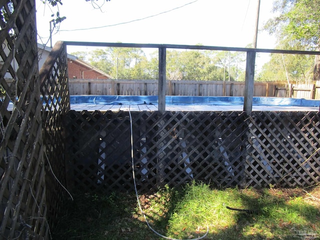 view of swimming pool featuring a fenced in pool and a fenced backyard