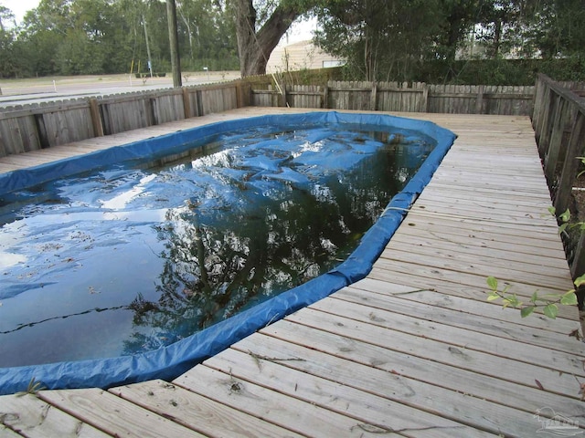 view of pool featuring a fenced backyard and a fenced in pool