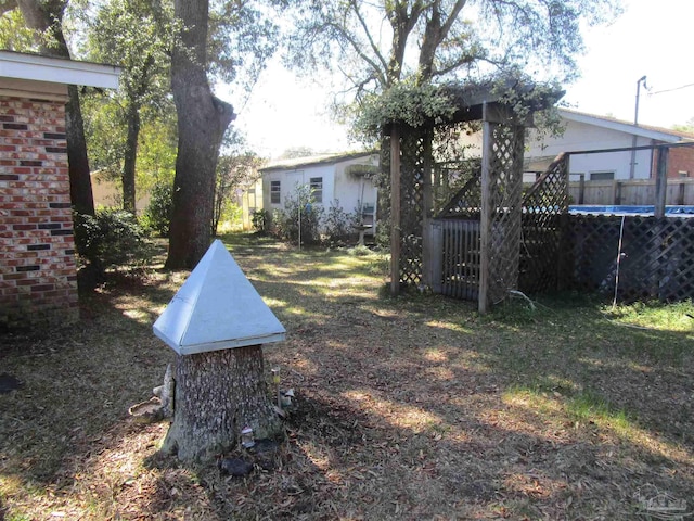 view of yard with a trampoline