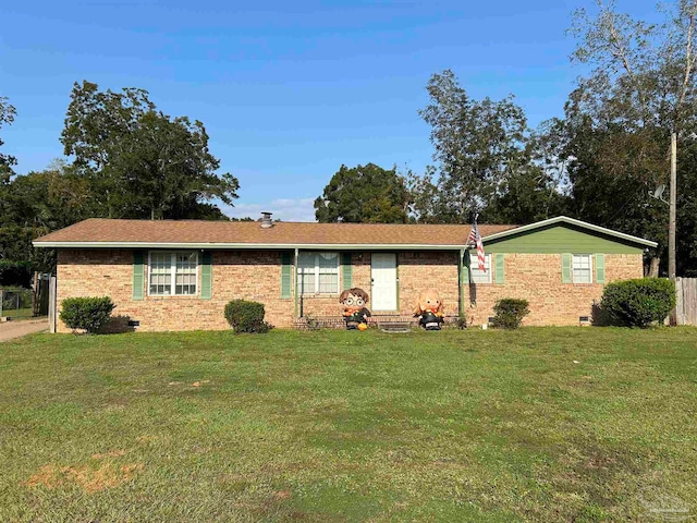 ranch-style house with a front lawn