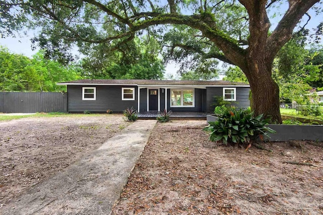 ranch-style home featuring covered porch