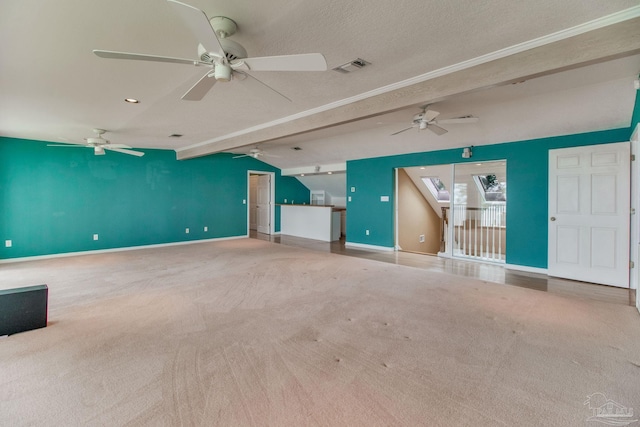 unfurnished living room featuring carpet floors, baseboards, lofted ceiling with beams, and visible vents