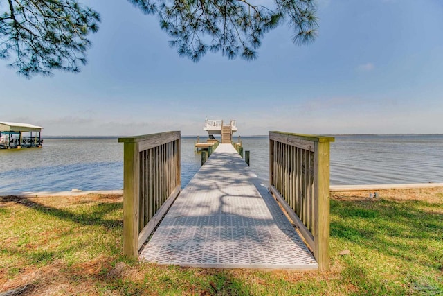 dock area featuring a water view