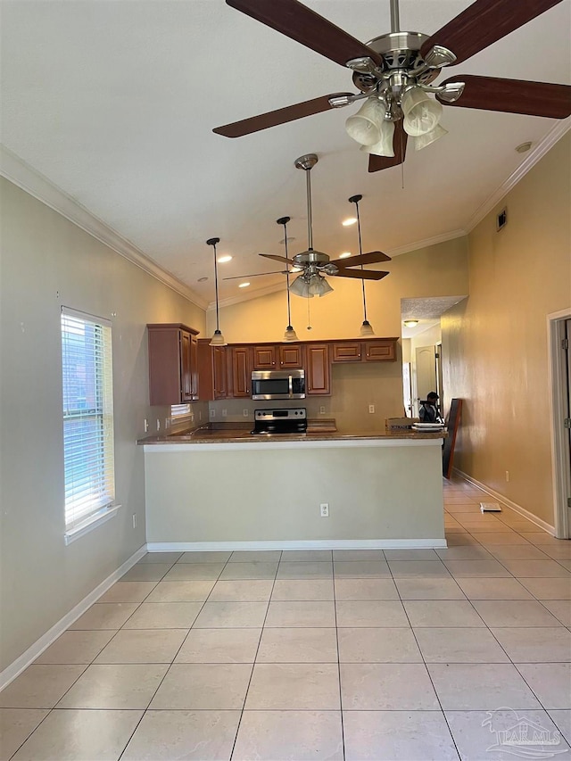 kitchen featuring kitchen peninsula, ceiling fan, appliances with stainless steel finishes, and crown molding