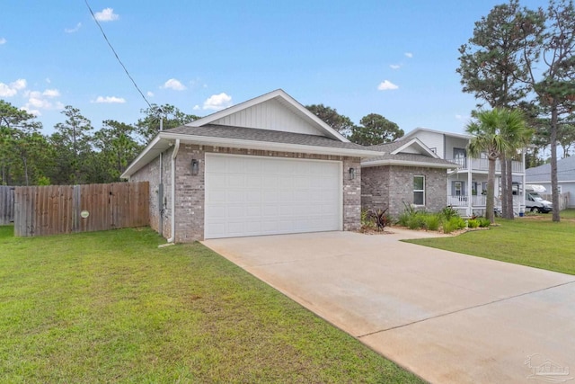 single story home featuring a front yard, a balcony, and a garage