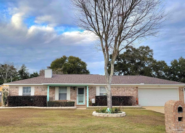 ranch-style home featuring a front yard and a garage