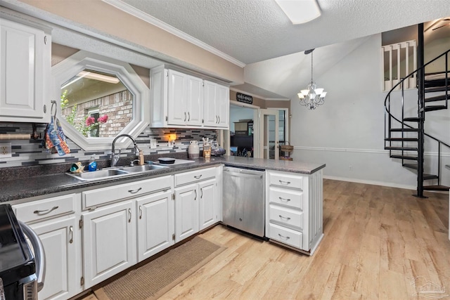 kitchen with light wood-type flooring, stainless steel appliances, kitchen peninsula, decorative backsplash, and white cabinets