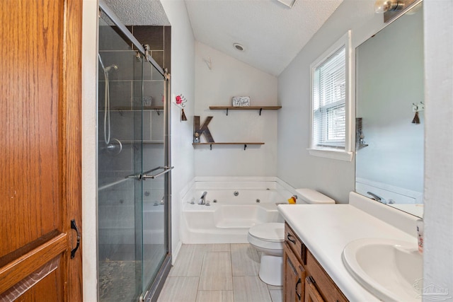 full bathroom with toilet, separate shower and tub, vanity, a textured ceiling, and lofted ceiling