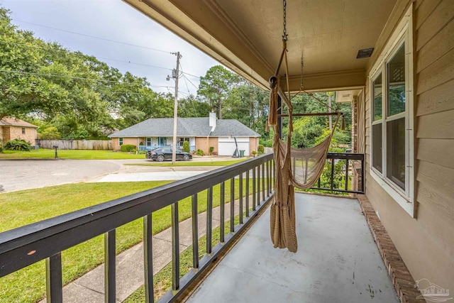 balcony featuring covered porch