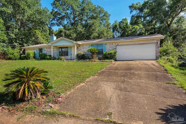 ranch-style home featuring a garage and a front lawn