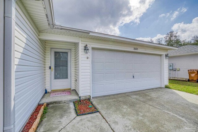 entrance to property with a garage