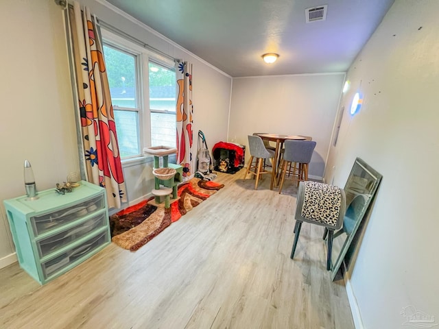 124 Mintz Ln, Cantonment, FL 32533 - playroom featuring visible vents, wood finished floors, and baseboards