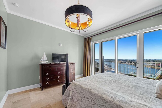13928 River Rd Unit 904, Pensacola, FL 32507 - bedroom with baseboards, ornamental molding, and access to outside