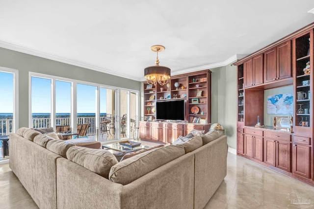 living area with a notable chandelier and ornamental molding