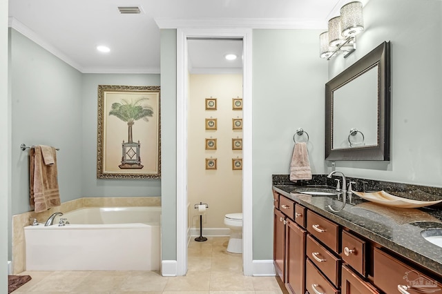 13928 River Rd Unit 904, Pensacola, FL 32507 - bathroom with visible vents, toilet, a sink, tile patterned flooring, and a bath