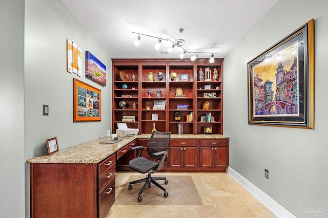 13928 River Rd Unit 904, Pensacola, FL 32507 - office space featuring track lighting, baseboards, and built in desk