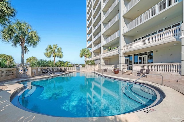 13928 River Rd Unit 904, Pensacola, FL 32507 - pool featuring a patio area and fence