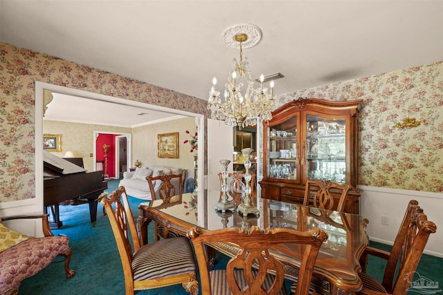 carpeted dining area featuring an inviting chandelier