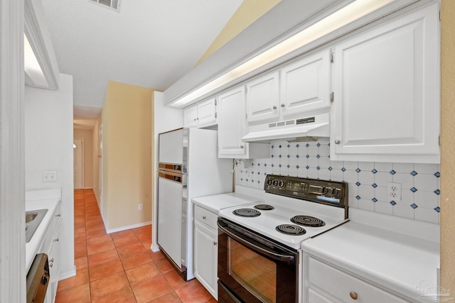 kitchen featuring backsplash, white cabinets, white appliances, and light tile patterned floors