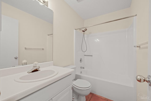 full bathroom with bathing tub / shower combination, a textured ceiling, toilet, tile patterned floors, and vanity