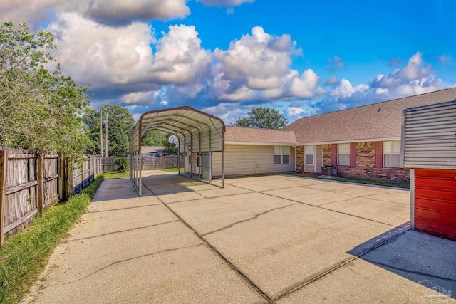 exterior space featuring a carport