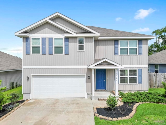 view of front of house featuring a garage, concrete driveway, roof with shingles, and fence