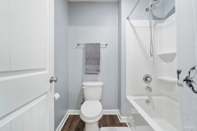 full bathroom with baseboards, shower / bathing tub combination, toilet, and wood finished floors