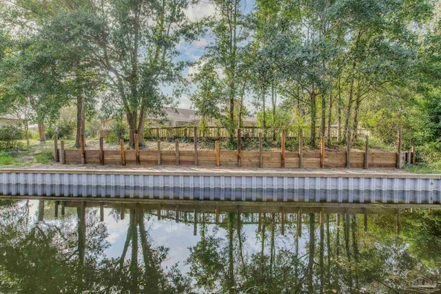 view of swimming pool with a water view