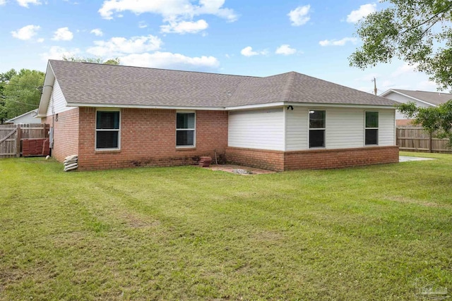 5732 Dove Dr, Pace, FL 32571 - back of house featuring brick siding and a shingled roof