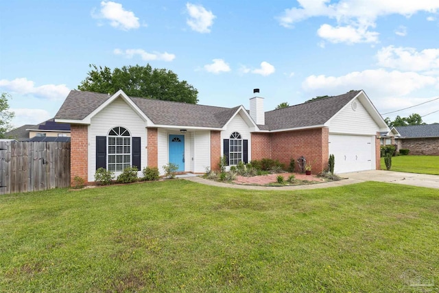 5732 Dove Dr, Pace, FL 32571 - single story home with brick siding, driveway, a chimney, a garage, and a shingled roof