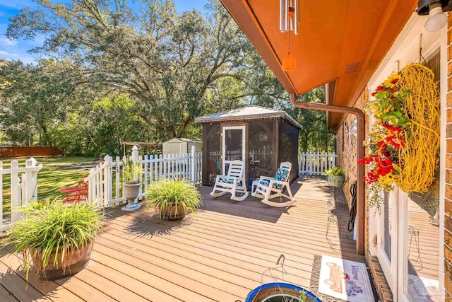 wooden deck with a storage unit