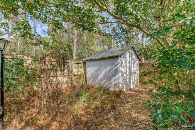 view of shed featuring a fenced backyard