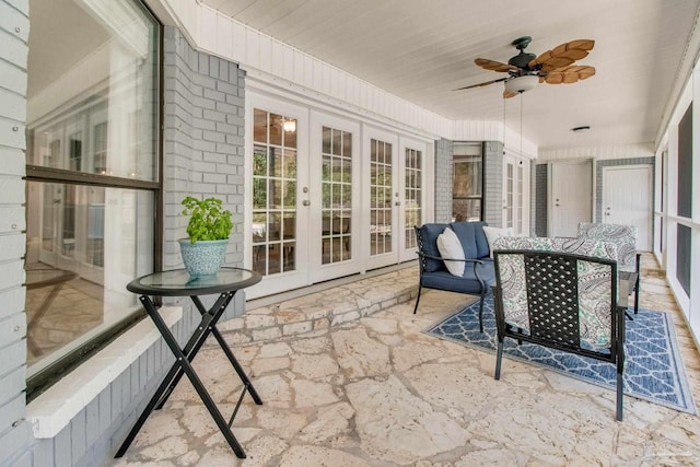 sunroom with french doors, wooden ceiling, and ceiling fan