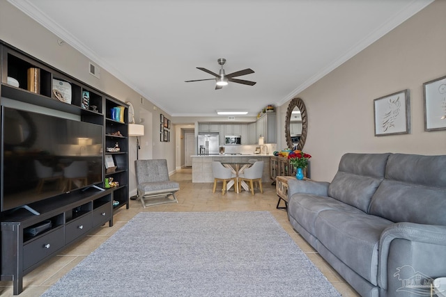 tiled living room with crown molding and ceiling fan