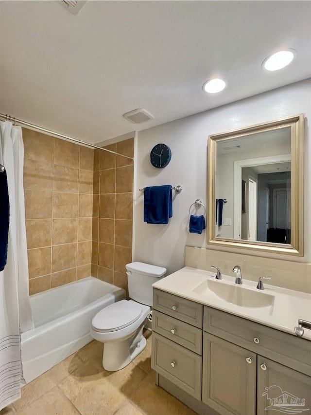 full bathroom with shower / bathtub combination with curtain, vanity, and toilet