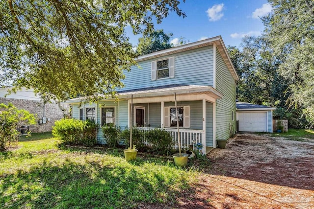 view of front of house with a garage and covered porch