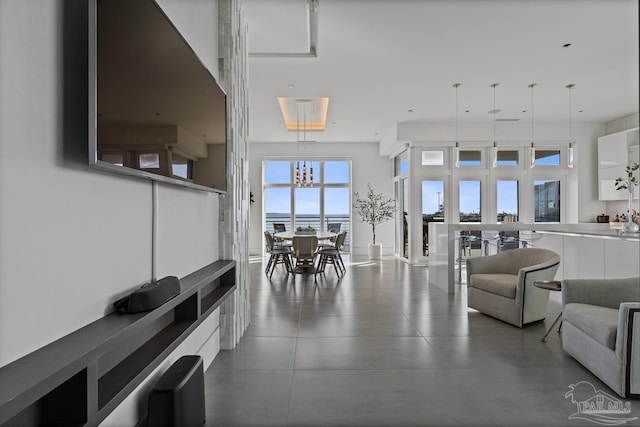 living room with a high ceiling