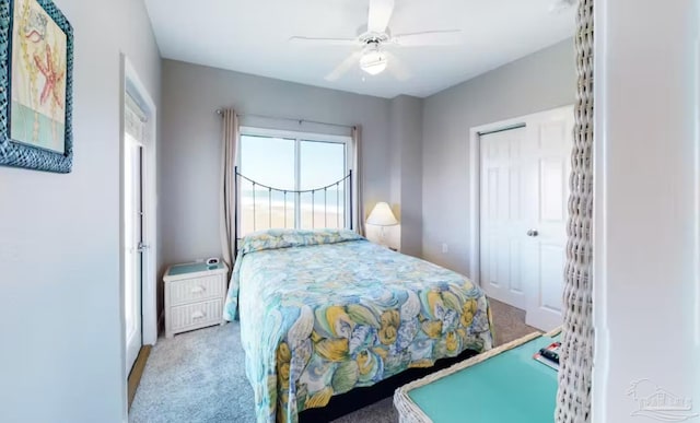 carpeted bedroom with ceiling fan