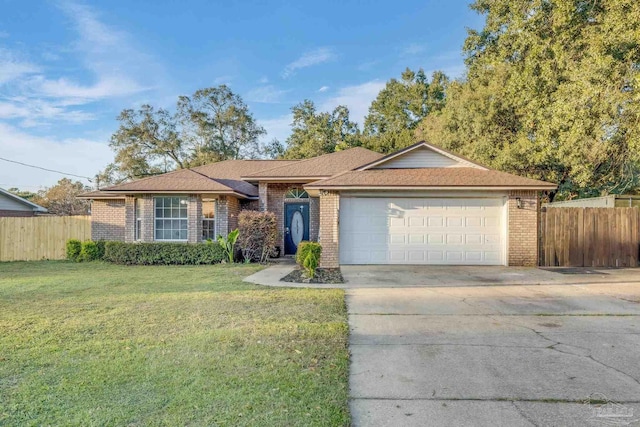 ranch-style house with a garage and a front lawn