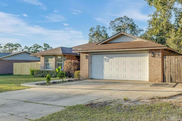 ranch-style house featuring a garage