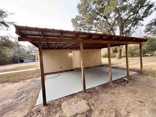 view of patio featuring a carport