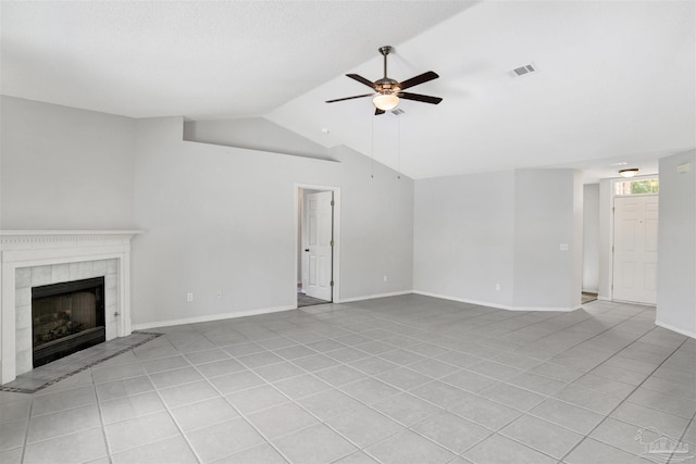 2252 Valle Escondido Dr, Pensacola, FL 32526 - unfurnished living room with light tile patterned floors, vaulted ceiling, a fireplace, visible vents, and a ceiling fan
