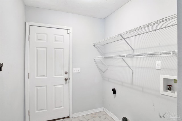 2252 Valle Escondido Dr, Pensacola, FL 32526 - laundry area featuring hookup for a washing machine, marble finish floor, laundry area, and baseboards