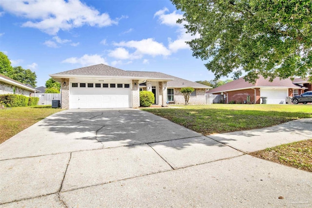 2252 Valle Escondido Dr, Pensacola, FL 32526 - single story home with brick siding, a front yard, and concrete driveway
