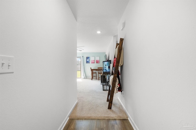 8743 Schooner Ln, Pensacola, FL 32507 - corridor with baseboards and wood finished floors