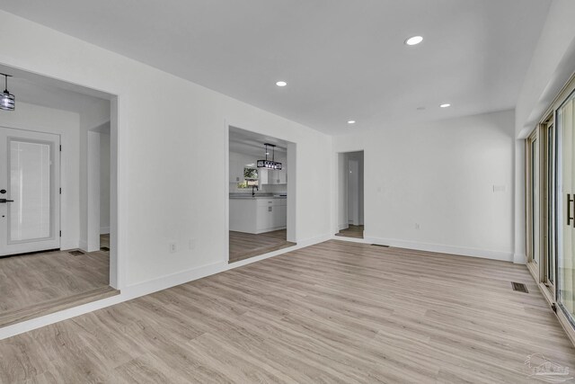 bathroom featuring hardwood / wood-style flooring, vanity, and toilet