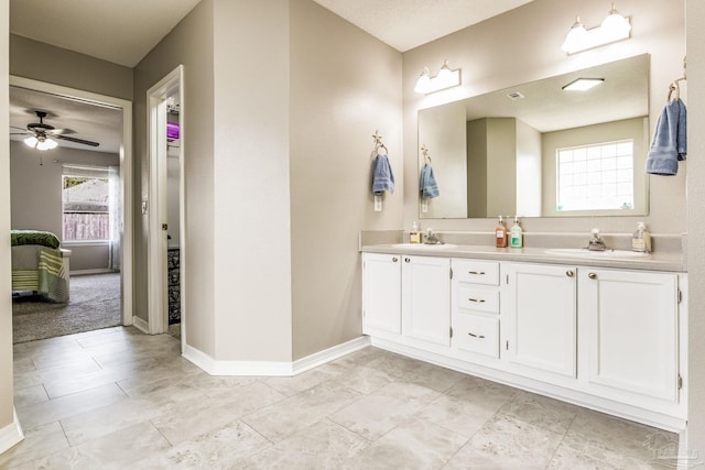 bathroom with vanity and ceiling fan