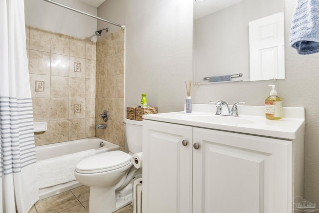 full bathroom with shower / bath combo, vanity, tile patterned floors, and toilet