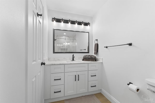 bathroom with vanity and an enclosed shower